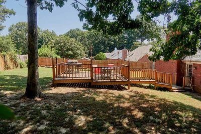 Nice deck next door.            IMG_2152.jpg