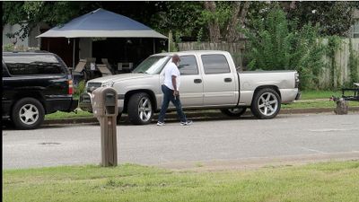 Rodney going to his truck, which has not moved in weeks.