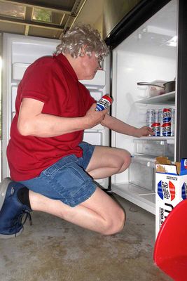 Restocking our fridge in the garage.      IMG_4412.jpg