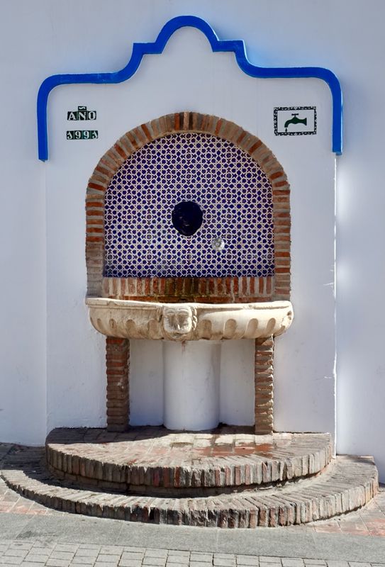Antique well in the old city centre