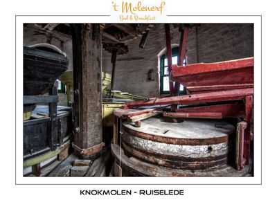 Partially opened wood casing from a pair of millstones.