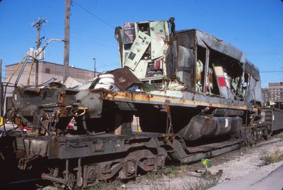 L&N depressed centerr flat 4997 with wrecked SBD paint CSX GP38.jpg