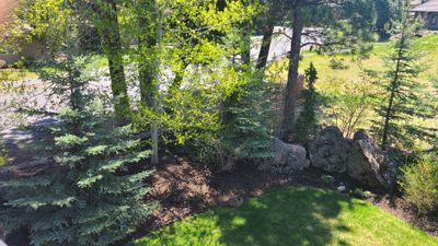 view of back yard from balcony