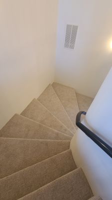 stairs to living room, kitchen, bedrooms