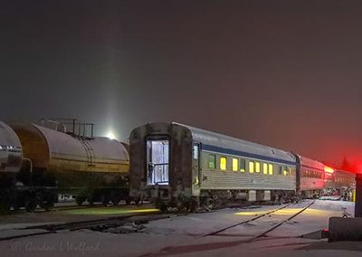 Light Pillar Beyond Trains At Night 90D51959