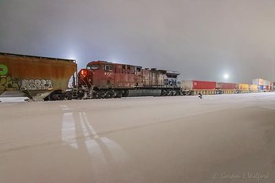 Eastbound Freight Train Mid-DPU On A Snowy Night 90D53047-51