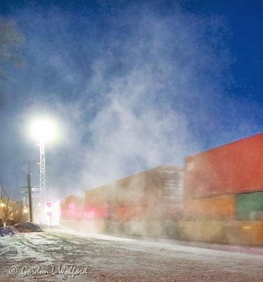 Westbound Freight Train Kicking Up Snow 90D54310