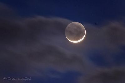 Clouded Waxing Crescent Moon 90D59236-40