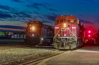 Two Westbound Freight Trains At Dawn 90D83417-21