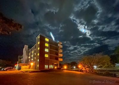 Hotel Under Moonlit Clouds (iPhone14-2560)