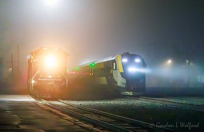 VIA Passing CPKC Freight In Night Fog 90D98369