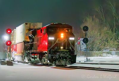 Eastbound Freight Train Arriving At Night 90D103574