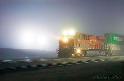 Westbound Freight Train In Night Fog 90D105031