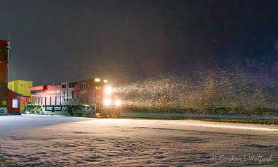 CP 8951 Departing At Night In Spring Snowstorm 90D107437