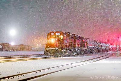 CPKC Tanker Train At Night In Spring Snowstorm 90D107381