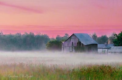 Old Barn In Ground Fog At Dawn 90D117338