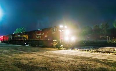 Eastbound Freight Train At Night 90D124095