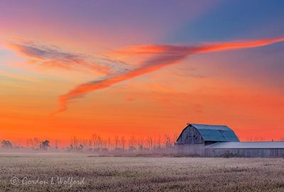 Sunrise Contrail Over Barn 90D126571