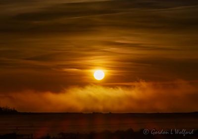 Sunrise Beyond Distant Steam Fog 90D130063-7