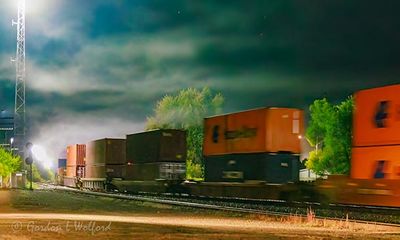 Eastbound Train Departing Into Night Fog 90D129496