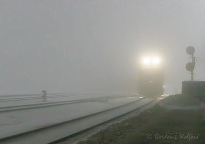 CPKC Freight Train In Night Fog 90D135323