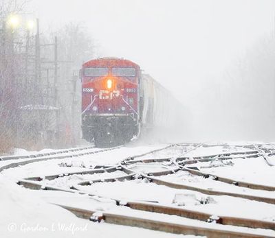Eastbound CPKC Train In Snowfall DSCN018196