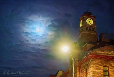 Clouded Snow Moon Beyond Clock Tower 90D140899