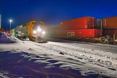 VIA Rail 41 Passing Parked Freight Cars 90D142258