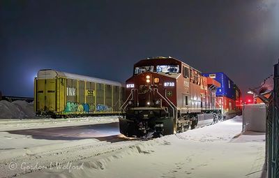 CPKC Westbound Freight Train At Night 90D143193