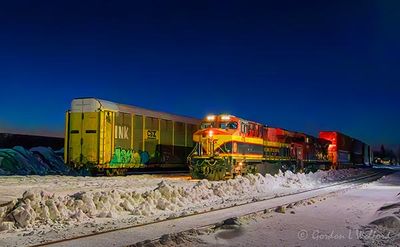 Westbound CPKC Freight Train Departing At Dawn 90D143892