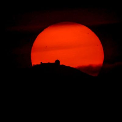 Sunrise behind Lick Observatories