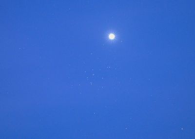Venus buzzing by the Beehive cluster