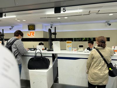 Getting our reserved Shinkansen train tickets