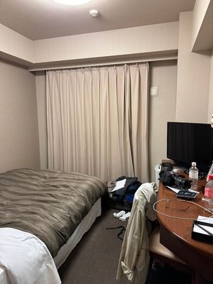 Western bed at Hotel Route-Inn in Ena