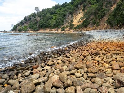 white, black, brown and red rock