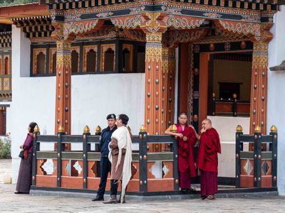 In Thimpu Dzong - Monks, Citisens and a Policeman