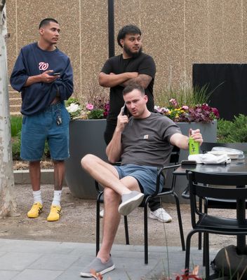 Guys relaxing on a nice spring afternoon.