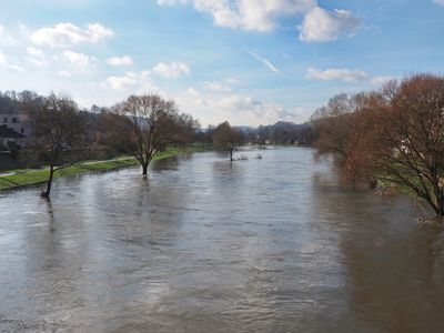 A bulging Sre river after prolonged heavy rainfall