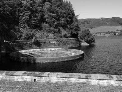 Plughole at Ladybower reservoir BW