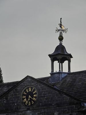 Tissington Hall - clock dial and weather vane