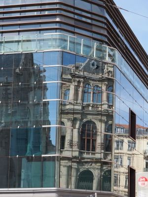Palais de la Bourse reflected