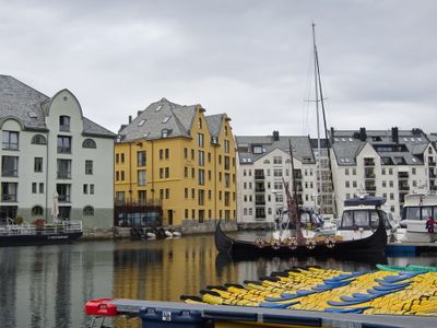 Kayaking alongside a Viking boat replica