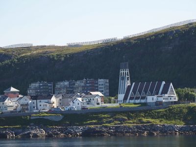 Hammerfest church with avalanche stoppers above