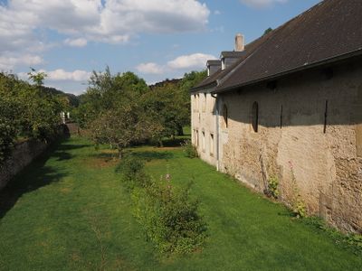 The farmhouse with part of the orchard