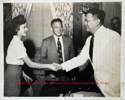 Philippine Pres, Ramon Magsaysay shakes the hand of PAL F/A Cristina Herranz