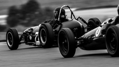 The Genie Mk I passing a Formula Vee.