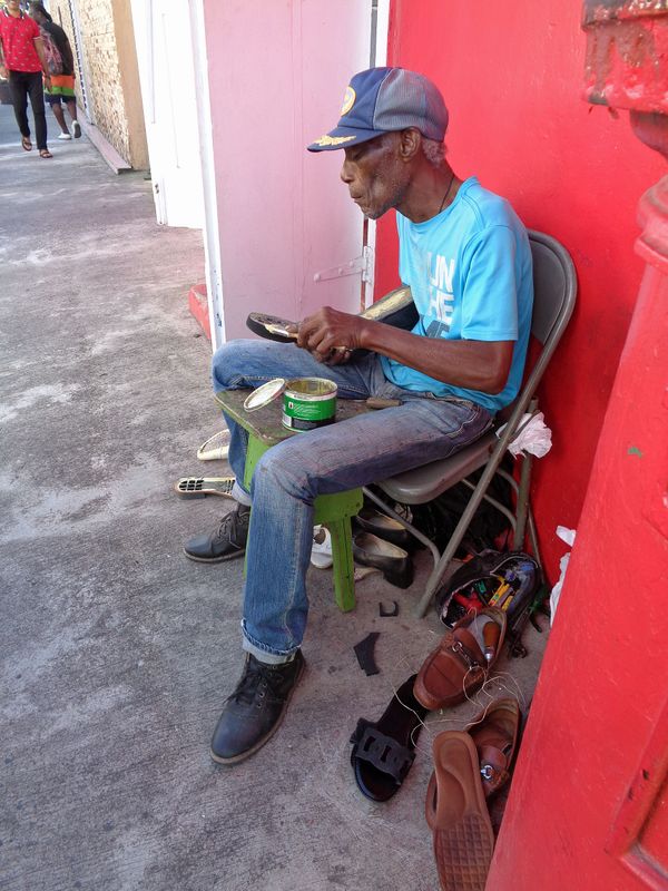 054 George, the Shoeman, to the Rescue 365 days per year.jpg