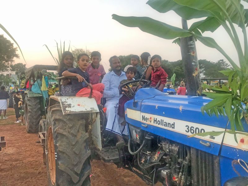 48 Each Family Shows Off Their Hardworking Tractor and the Kids.jpg