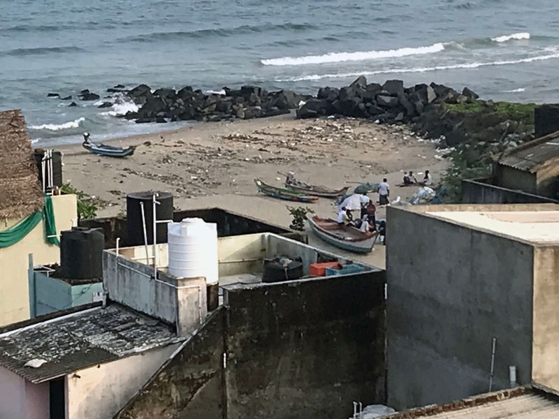 129 Doug Goes to our Rooftop and Discovers a Fishing Village.jpg