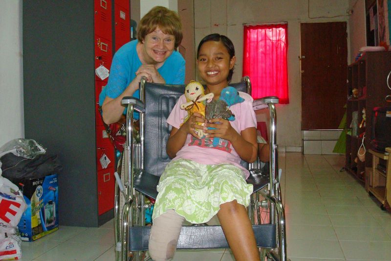 128 Pika with two dolls at the Orphanage.jpg